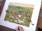 ボロルマーさんが実際に絵を描くようす。草原に馬やラクダ、羊、ヤギがいたり、モンゴルの伝統的住居ゲルが並んでいたりする