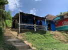 経済が崩壊したベネズエラから7年前に避難してきた元ベネズエラ国軍兵士のホセ・ナサリオさんが暮らすコロンビアの貧国地区アヒサル。写真は住民が集う飲み屋
